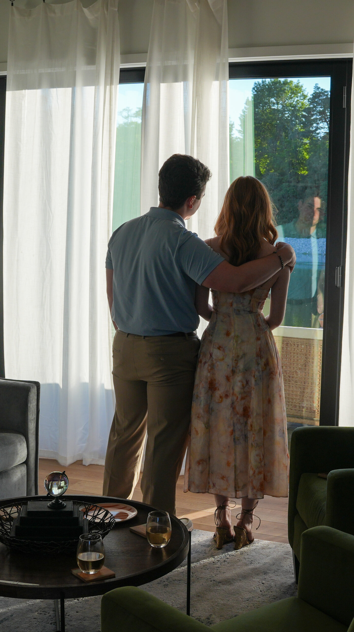 Bride and groom taking in the view from their Sandblox resort bungalow